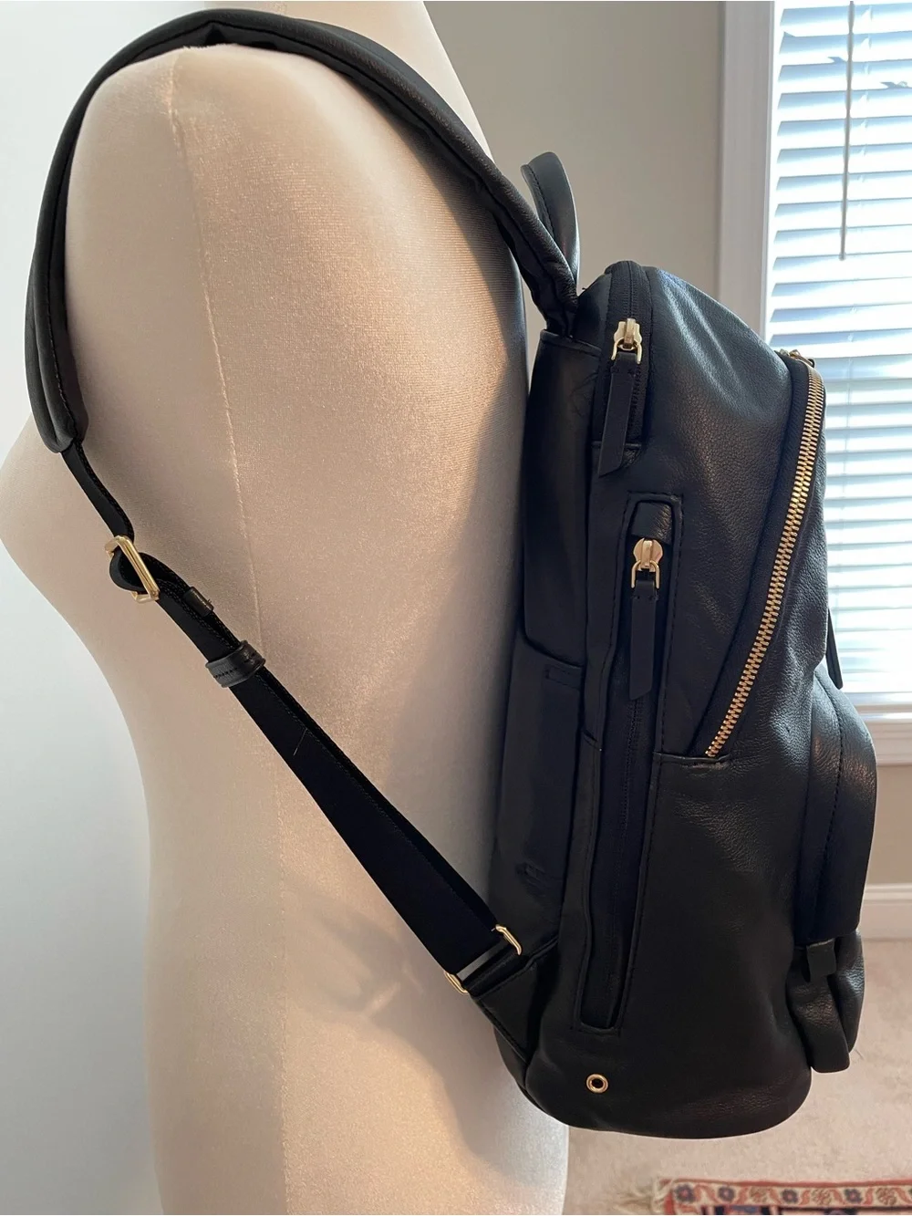 Tumi Black Leather Backpack with Goldtone Hardware